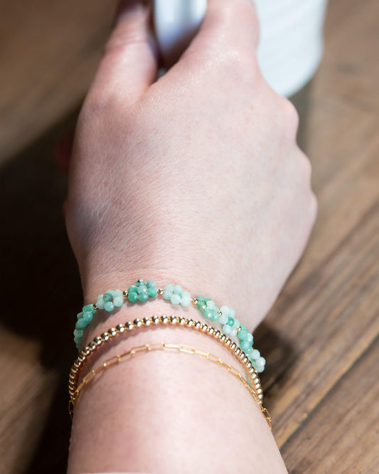 Pale and bright green Emerald beaded daisy chain bracelet with 14k gold-filled accents and spring ring clasp.