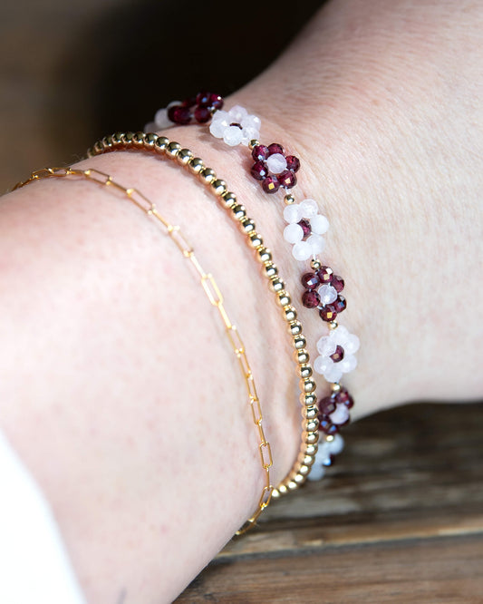 Garnet and Rose Quartz beaded daisy-chain bracelet with 14k gold-filled accents and spring ring clasp.