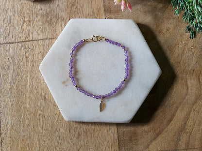 Dainty amethyst gemstone beaded bracelet with sterling silver charm and spring ring clasp