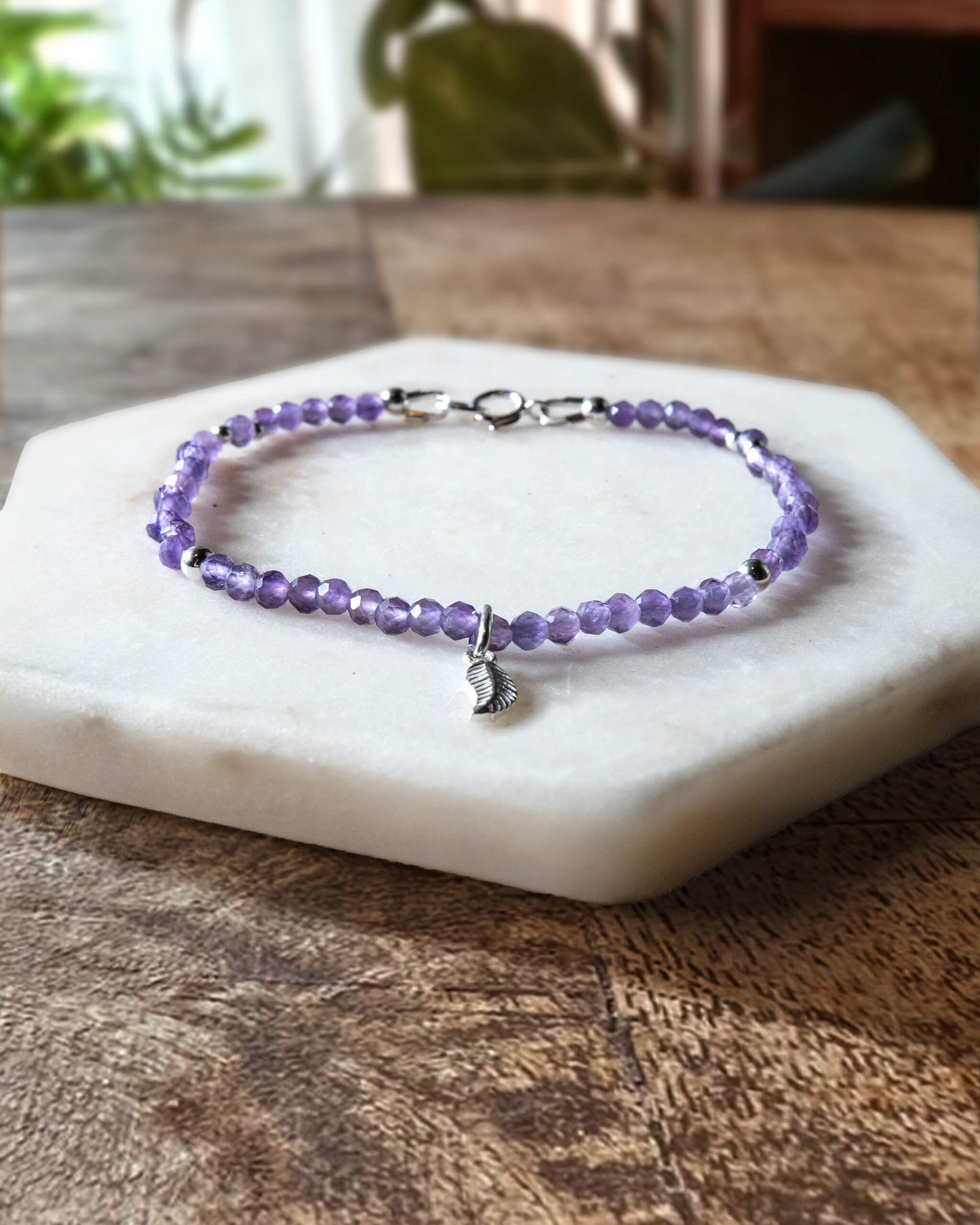 Dainty amethyst gemstone beaded bracelet with sterling silver charm and spring ring clasp