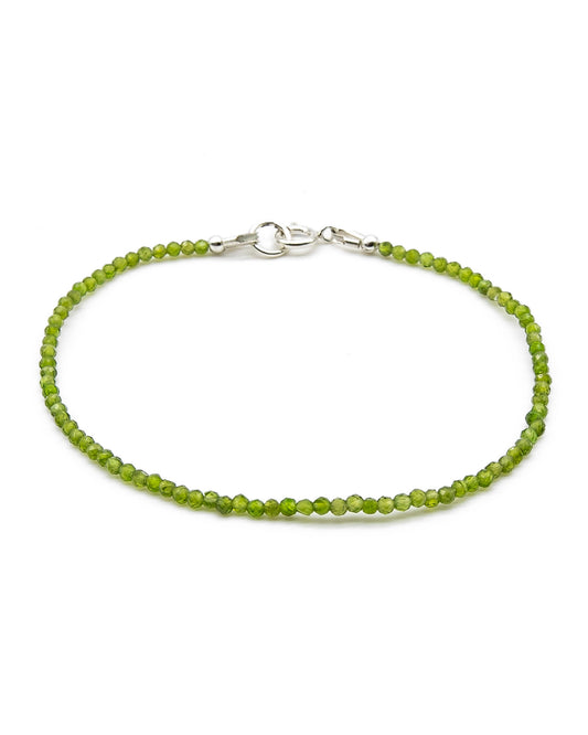 Dainty green chrome diopside beaded gemstone bracelet with sterling silver spring ring clasp.