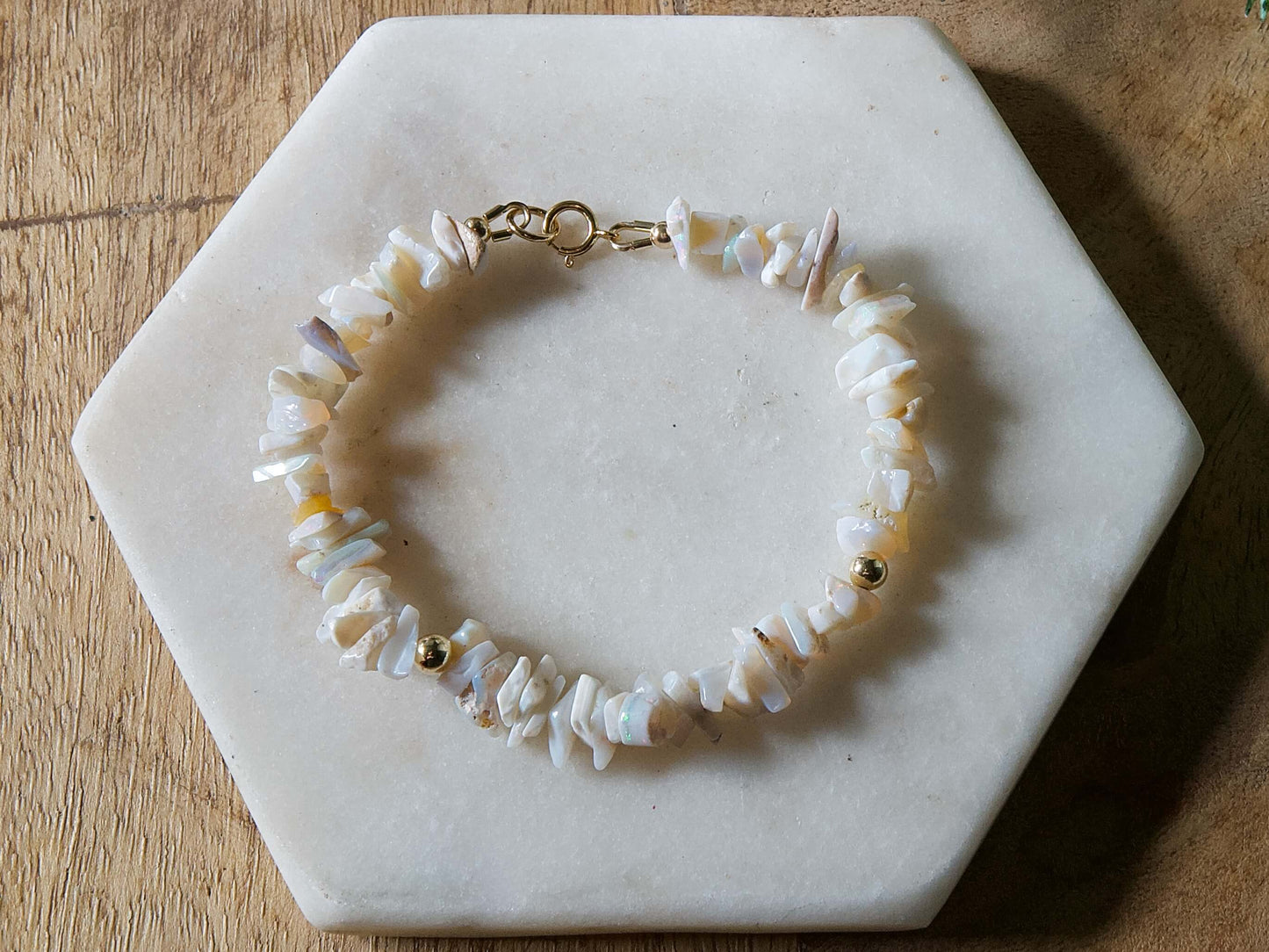 Pale off-white and grey opal chip gemstone beaded bracelet with 14k gold-filled accent beads and spring ring clasp.