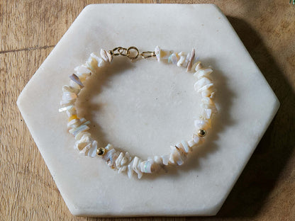 Pale off-white and grey opal chip gemstone beaded bracelet with 14k gold-filled accent beads and spring ring clasp.