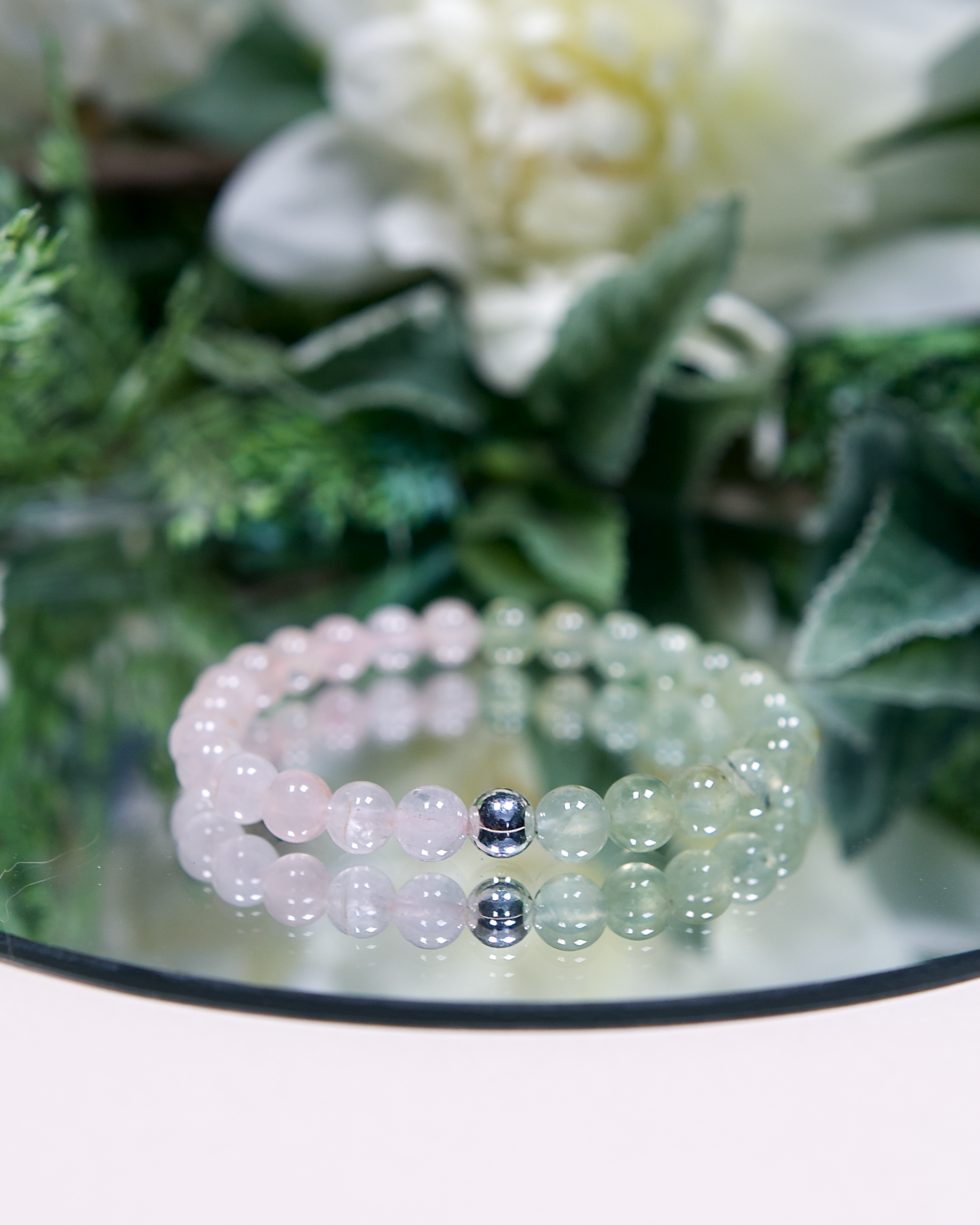 Close up of Heart Sanctuary bracelet with 6mm pink Rose Quartz and pale green Prehnite beads