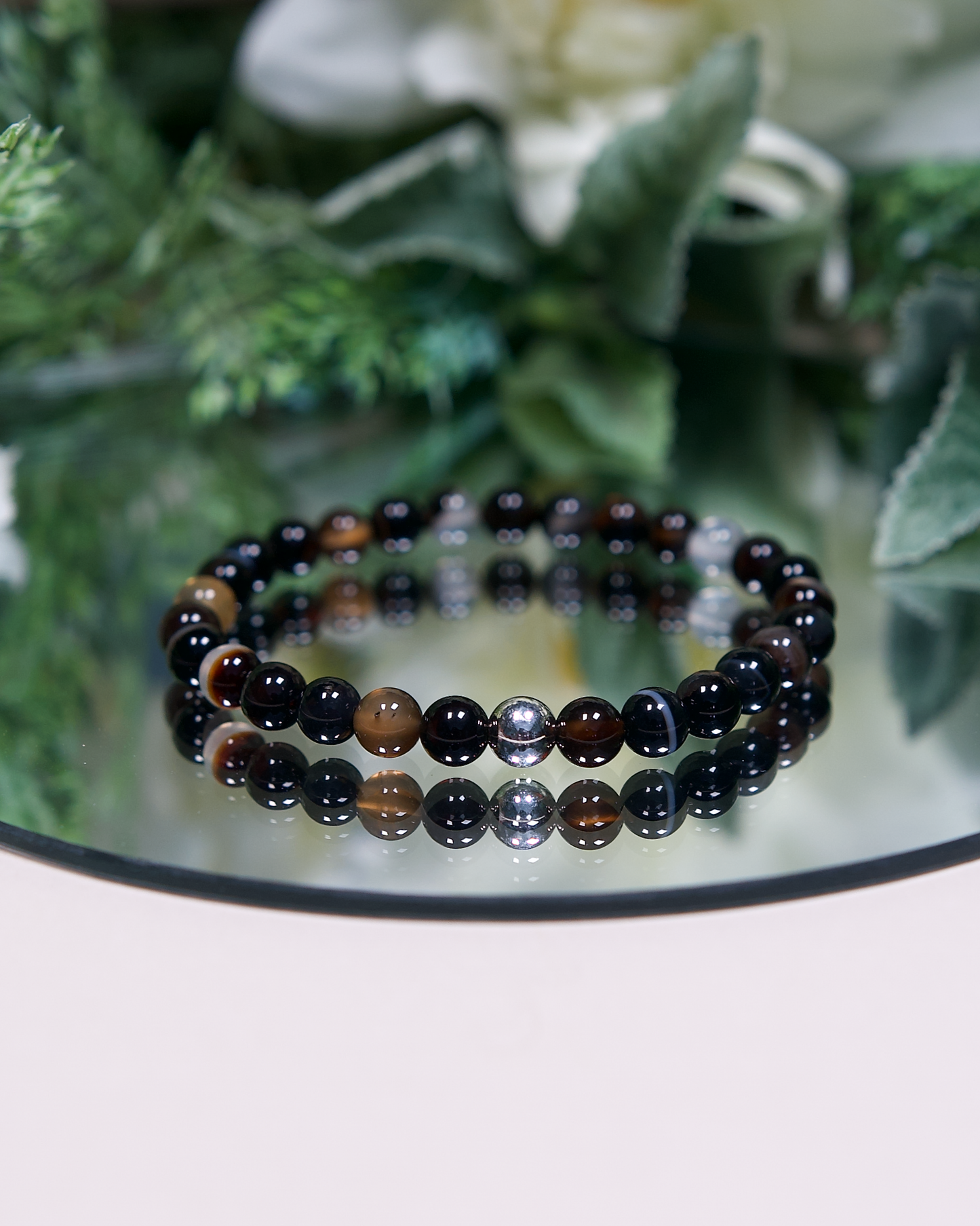 Botswana Agate beaded gemstone bracelet with sterling silver accent bead.