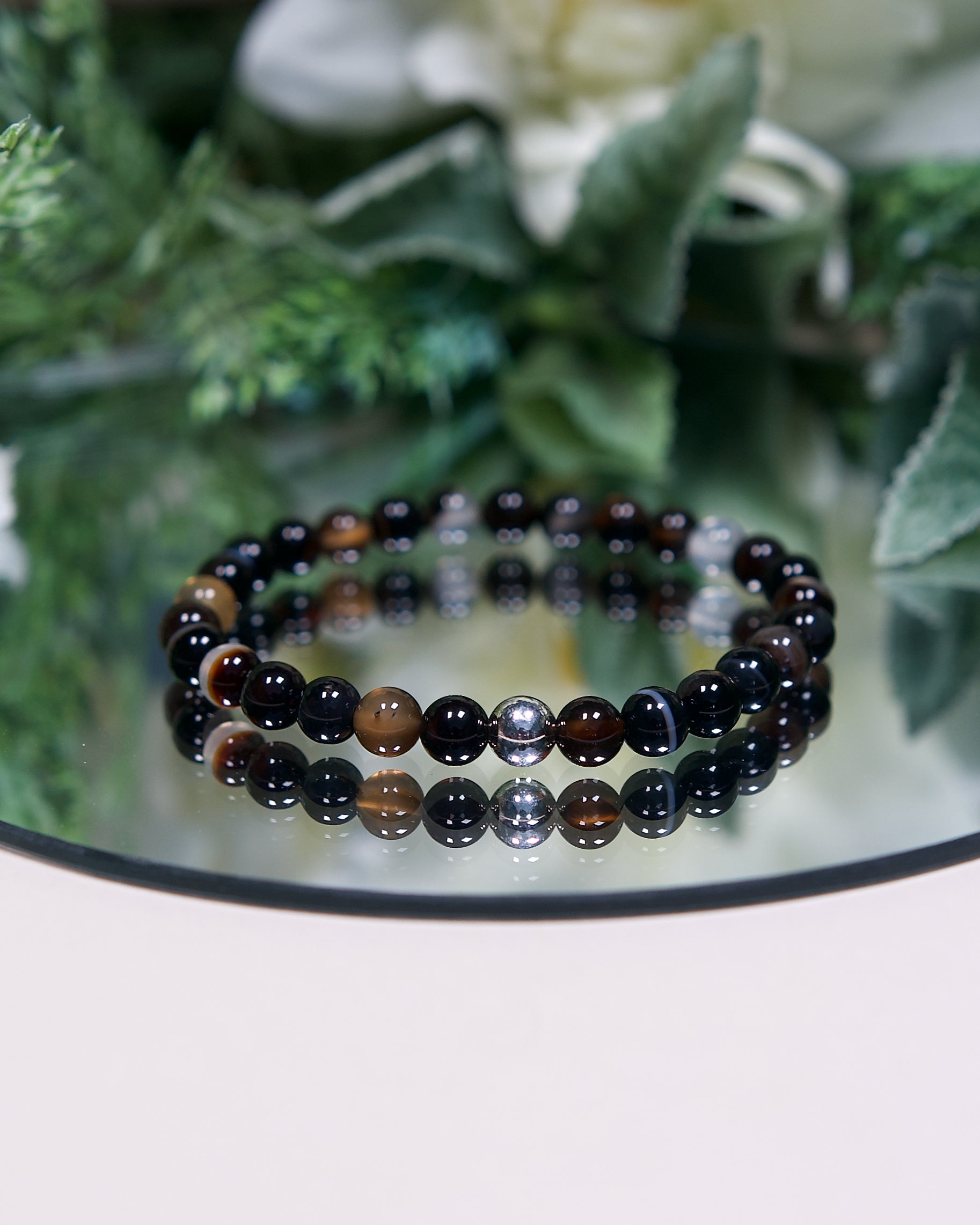 Botswana Agate beaded gemstone bracelet with sterling silver accent bead.