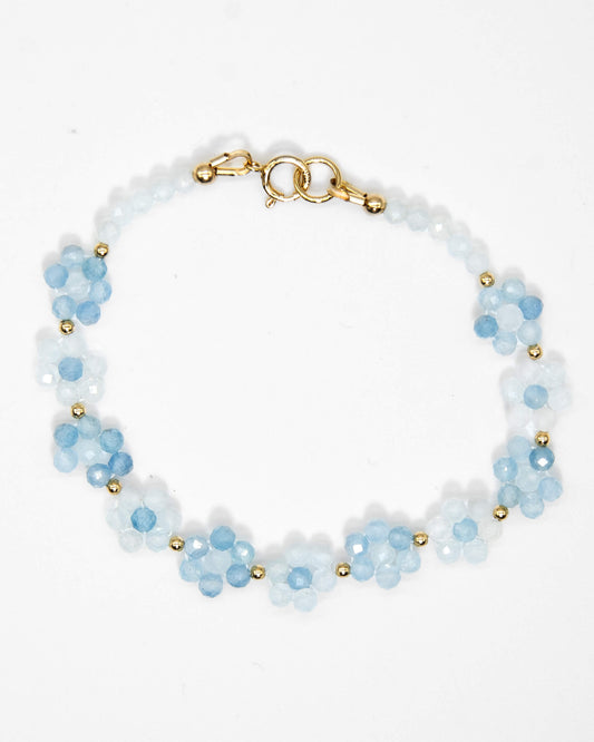 Pale and sky blue aquamarine beaded daisy chain bracelet with 14k gold-filled accents and spring ring clasp.