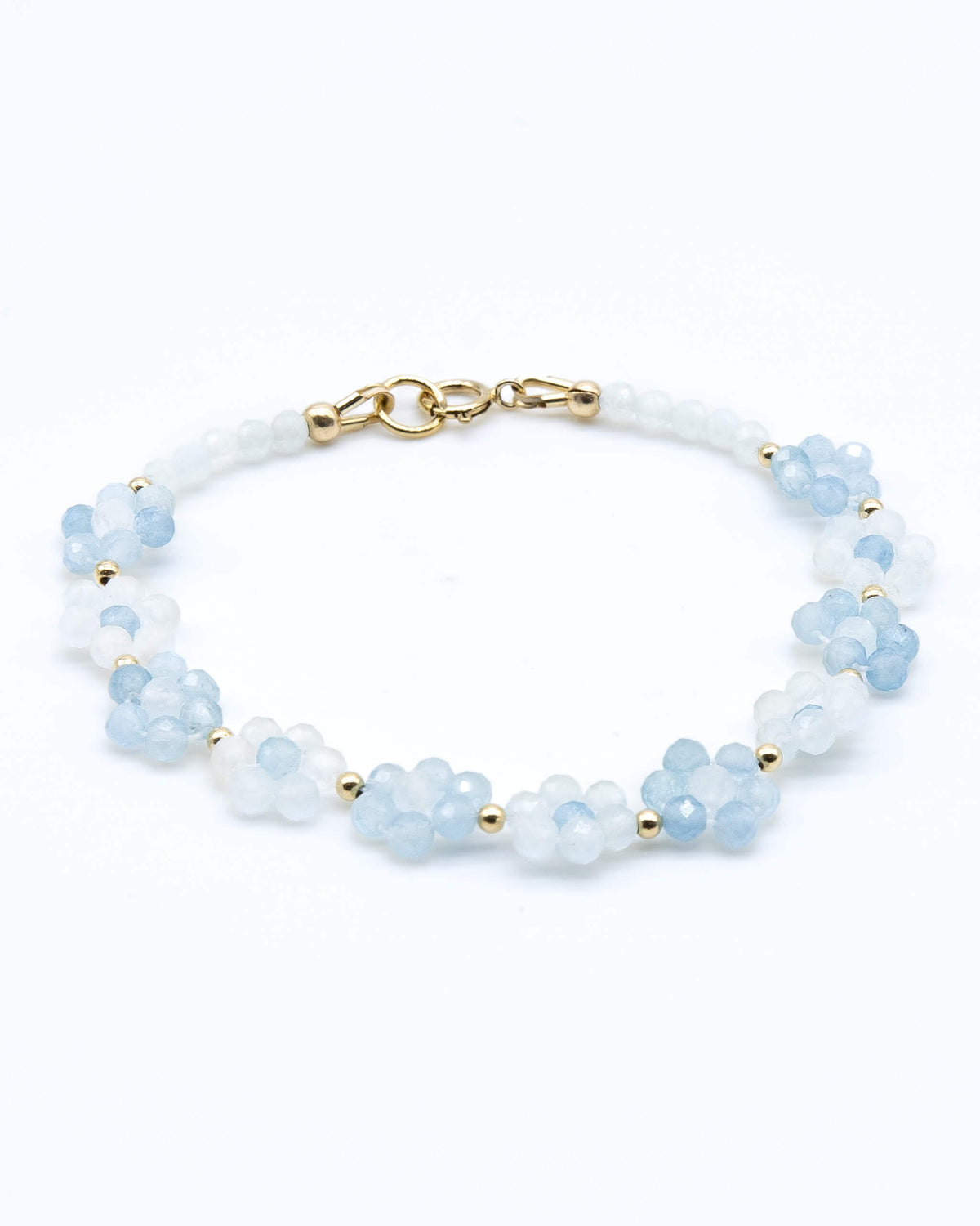 Pale and sky blue aquamarine beaded daisy chain bracelet with 14k gold-filled accents and spring ring clasp.