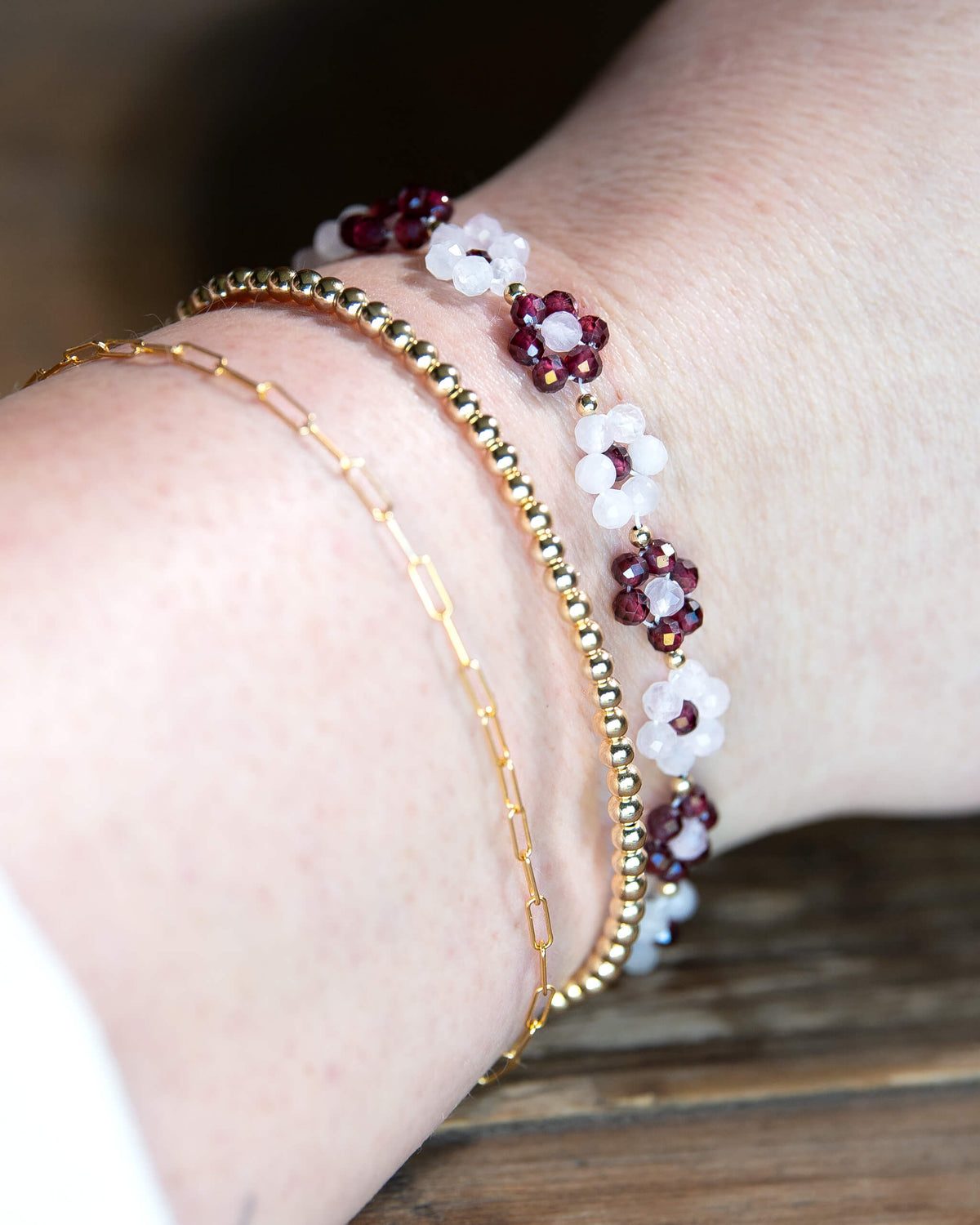 Garnet and Rose Quartz beaded daisy-chain bracelet with 14k gold-filled accents and spring ring clasp.