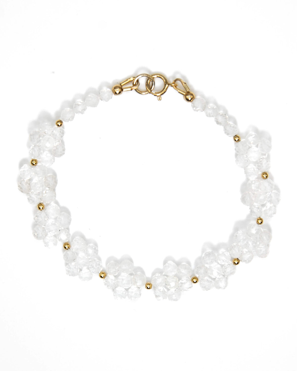 Clear quartz beaded daisy chain bracelet with 14k gold-filled details and spring ring clasp.
