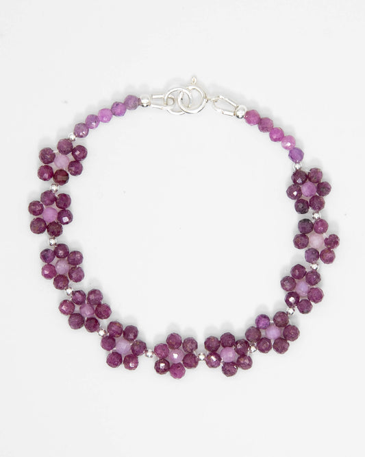 Pale and dark Ruby beaded daisy chain bracelet with sterling silver accents and spring ring clasp.