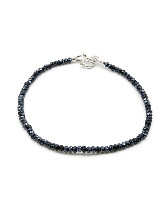 Dainty dark silver hematite beaded gemstone bracelet with sterling silver spring ring clasp.