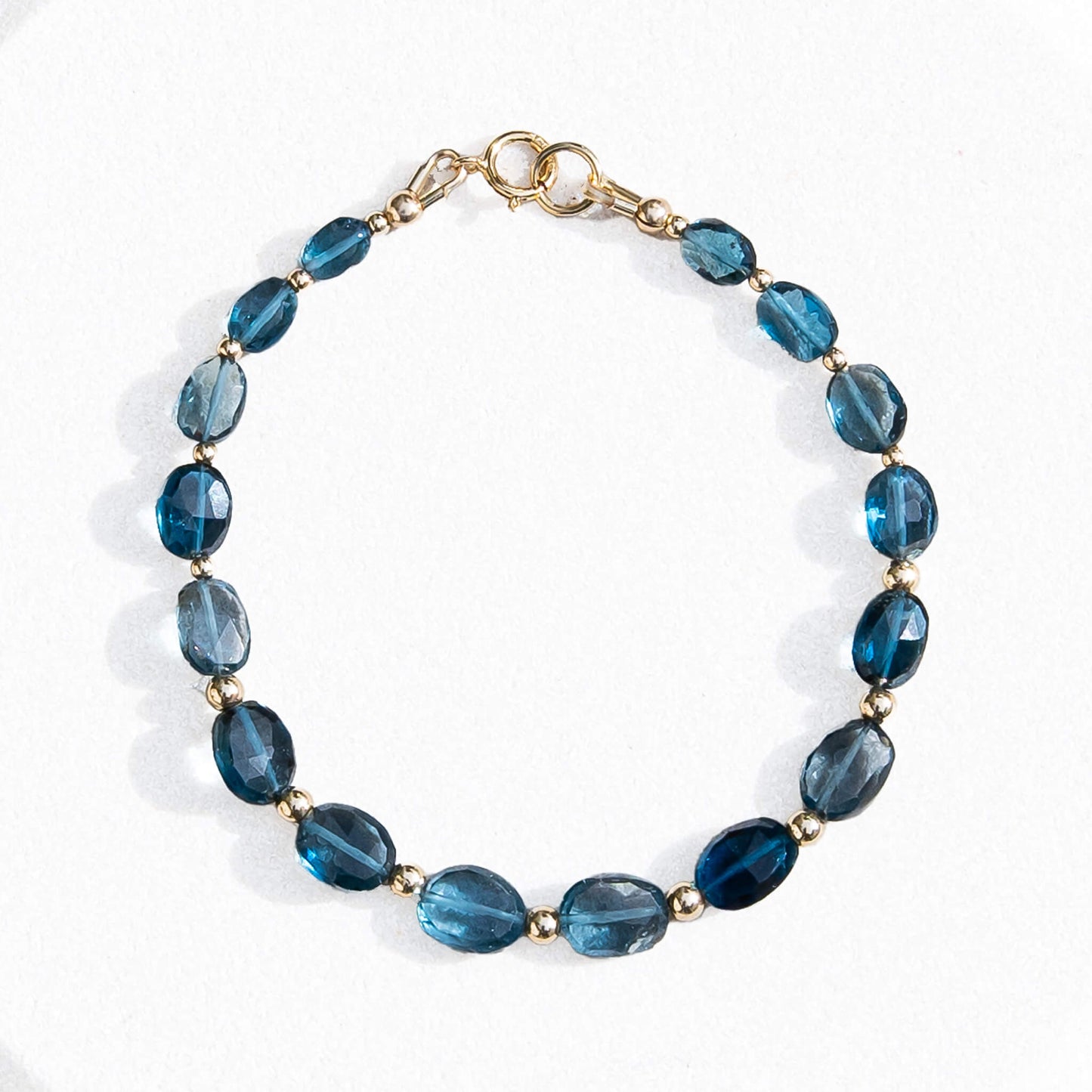 Dizzy Girl London Blue Topaz 14k Gold-Filled Graduated Faceted Oval Bracelet