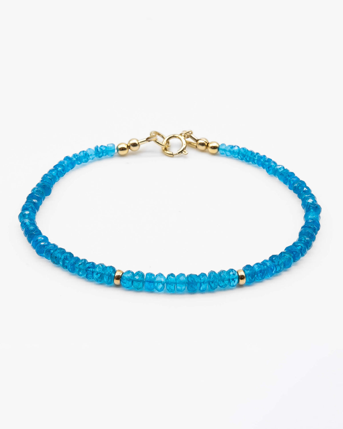 Neon blue Apatite beaded gemstone bracelet with 14k gold-filled accents and spring ring clasp.