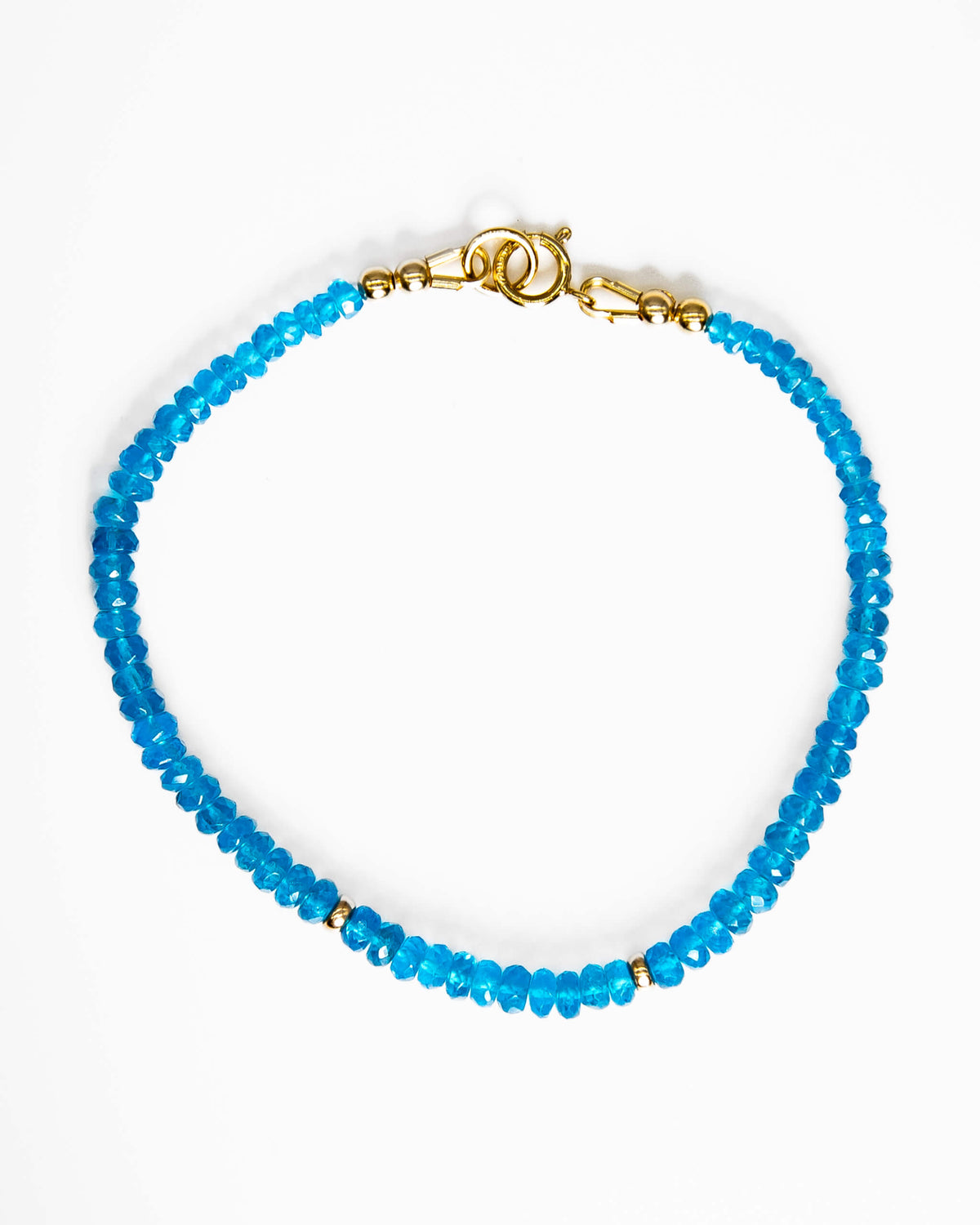 Neon blue Apatite beaded gemstone bracelet with 14k gold-filled accents and spring ring clasp.