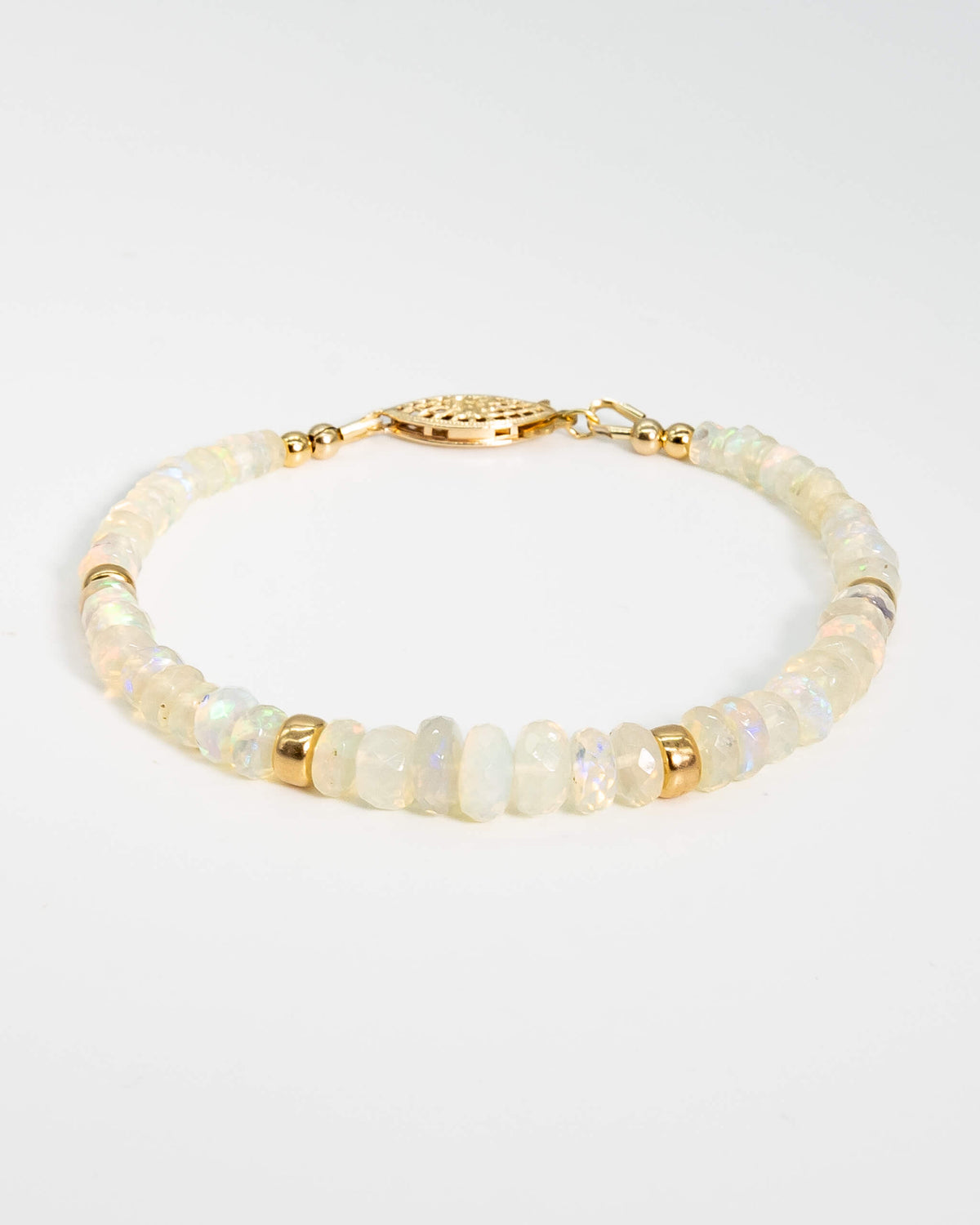 Natural opal gemstone beaded bracelet with rainbow flashes, 14k gold-filled accent beads, and a 14k gold-filled fish-hook clasp.