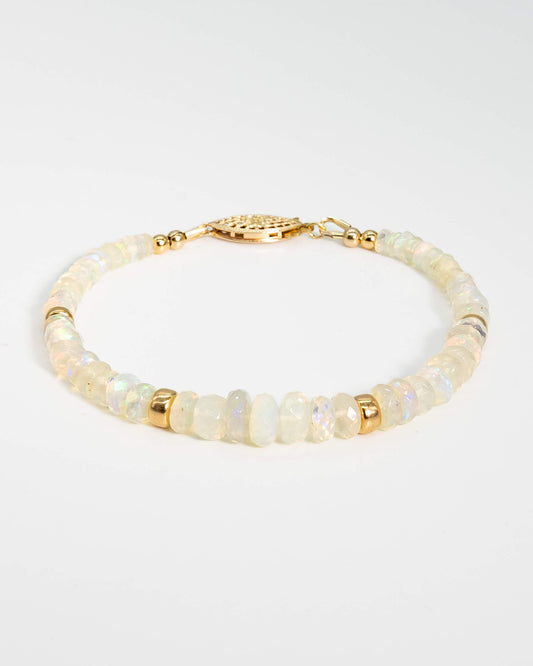 Natural opal gemstone beaded bracelet with rainbow flashes, 14k gold-filled accent beads, and a 14k gold-filled fish-hook clasp.