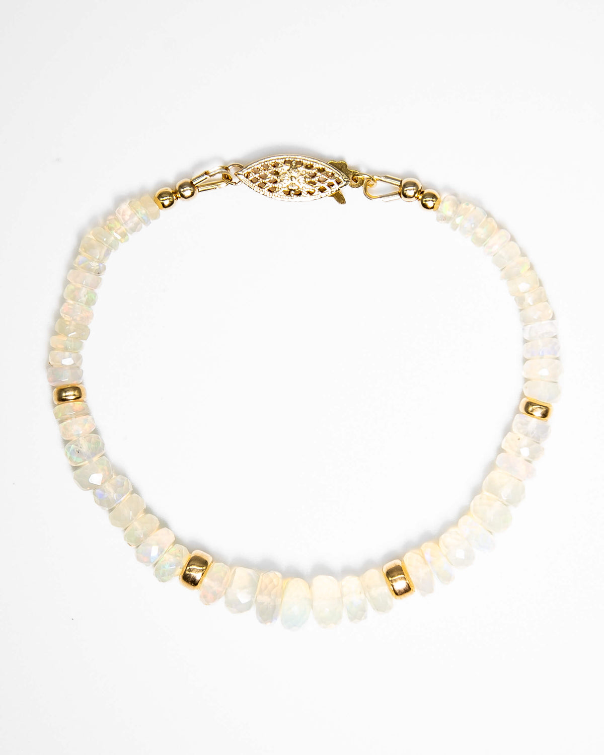 Natural opal gemstone beaded bracelet with rainbow flashes, 14k gold-filled accent beads, and a 14k gold-filled fish-hook clasp.