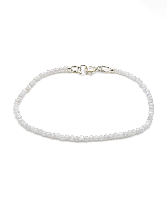 Dainty white zircon beaded gemstone bracelet with sterling silver spring ring clasp.